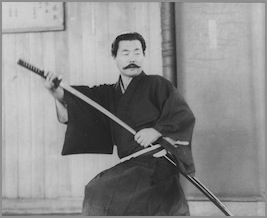 Mitsuzuka Sensei drawing his sword in Ryuto
